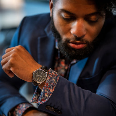 Rue Canal Watch - Night Dial on Man Reading